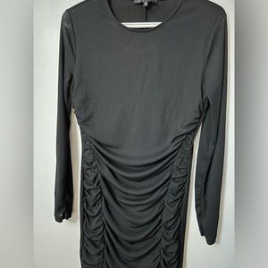 Ruched black dress with long semi sheer sleeves